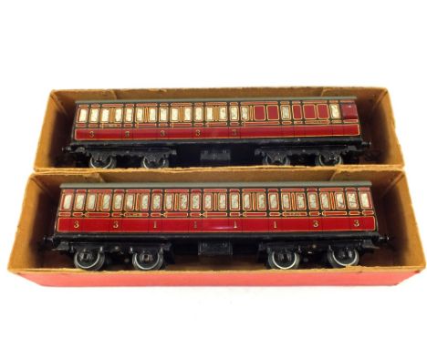 A boxed Hornby 0 gauge No.2 passenger coach LMS (brake-third) and a boxed Hornby 0 gauge No.2 passenger coach LMS (first-thir