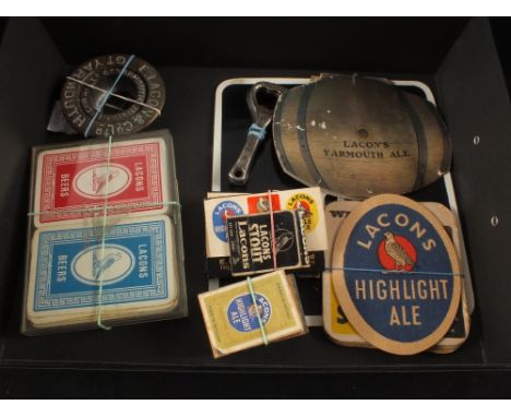Various small Lacons collectables including playing cards, tap holder, bottle openers, matchboxes, beer mats and a souvenir v