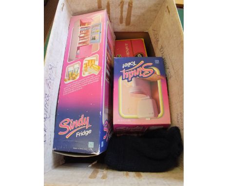 A quantity of unboxed Cindy dolls with Cindy accessories and a boxed Action Man