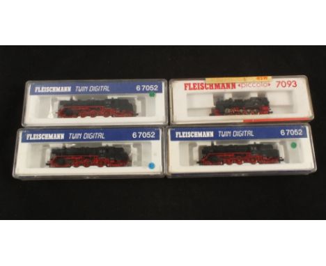 Three boxed Fleischmann twin digital locos and one other