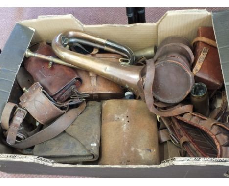 WWI military equipment including binoculars in case, bugle, 08 webbing belt 03 bandoleer, field saw, wire cutters, Sam Brown 
