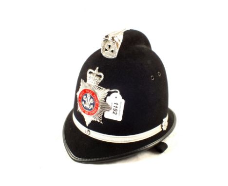 A Police helmet (Coxcomb) with South Wales plate, early riot type