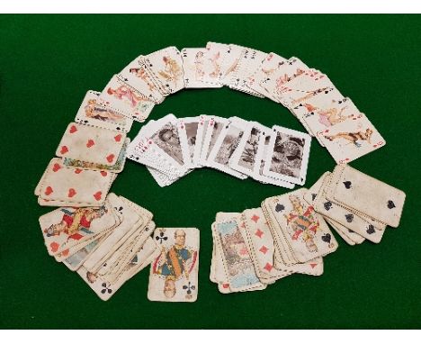 A pack of CL Würst of Frankfurt playing cards depicting various city scenes, island scenes, together with a pack of East Afri