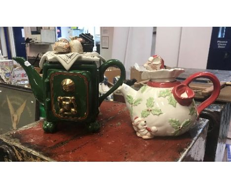 Four Cardew design novelty teapots, one as a Chinese tea shop, another as vintage sewing machine, all signed "P Cardew", toge