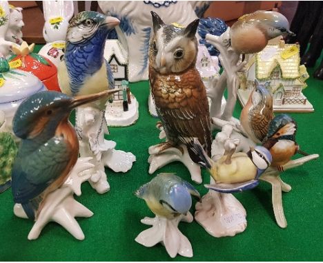 Five various Karl Ens bird figures together with a Goebel bird figure "blue titmouse" and another "kingfisher"