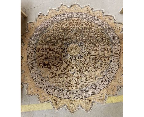 A vintage Chinese circular rug, the central panel set with floral and bird decoration on a rust ground, within a stepped flor