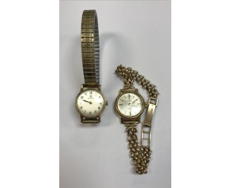 A ladies gold cased Omega Seamaster DeVille wristwatch with 9 carat chainlink strap and a ladies Omega wristwatch with Arabic