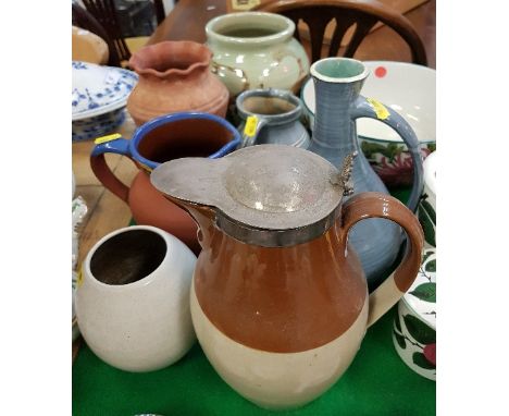 A collection of various studio pottery including pale green glazed vase inscribed "Finch" and date 1953, a Marazion blue glaz