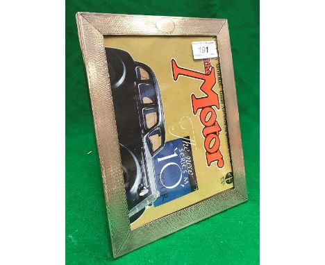 A George V silver photo frame with engine turned decoration (Birmingham 1910) stamped "Finnigans Manchester"