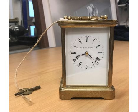 A modern brass five glass carriage clock, the white enamel dial inscribed "Matthew Norman London", set with Roman numerals
