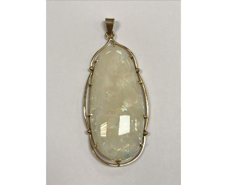 A large Australian opal pendant in 18 carat gold mount