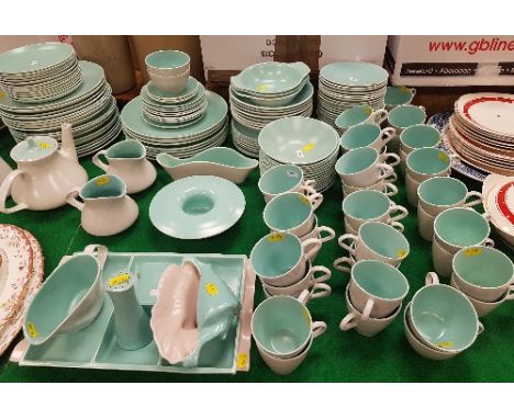 A large collection of Poole twin-tone dinner wares in grey and mint, to include dinner plates, coffee pot, tureens, bowls, ho