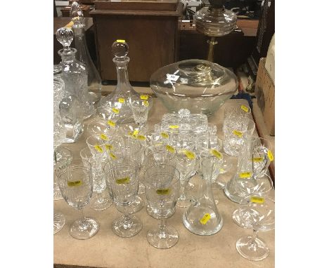 Four various decanters to include a Dartington decanter together with various cut wine glasses and champagne saucers etc