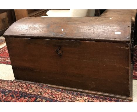 A 19th Century Continental oak dome dop trunk of slightly tapered form with iron carrying handles