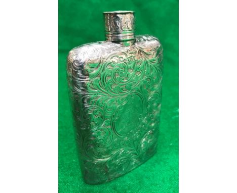 A small silver hip flask in the manner of Nathaniel Mills (maker's mark rubbed, Birmingham 1852), bears coat of arms / crest 