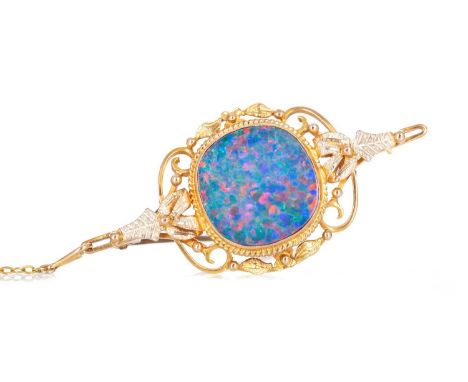 OPAL DOUBLET BROOCH, set with a cushion shaped opal doublet, marked 9CTQty: 7g