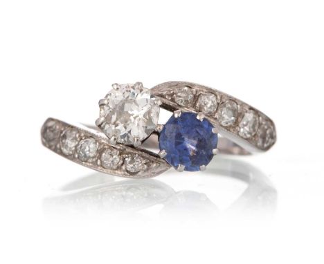 ART DECO SAPPHIRE AND DIAMOND RING, set with approximately 0.70 carats of diamonds and a single sapphire, in platinum, size M