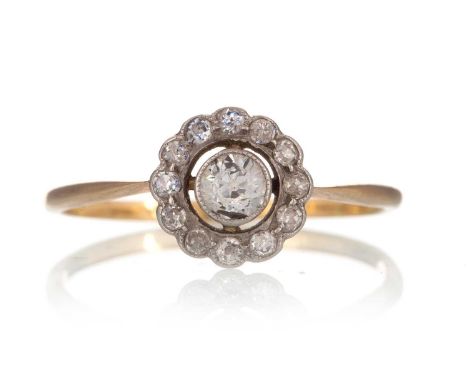DIAMOND CLUSTER RING, set with old cut diamonds totalling approximately 0.50 carats, unmarked, size T Qty: 1.9gStones heavily