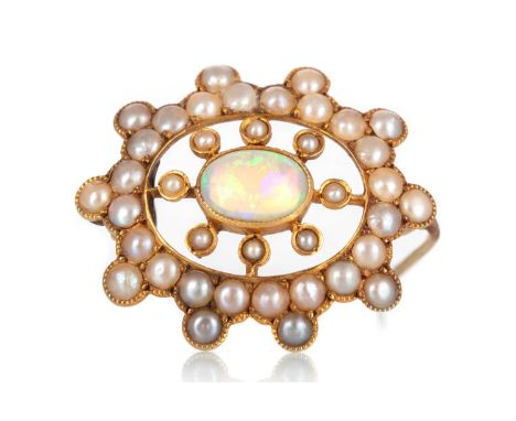 OPAL AND SEED PEARL BROOCH, set with a central opal within a halo of seed pearls, marked 15CT