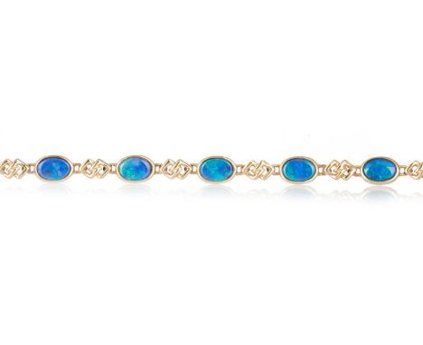 OPAL DOUBLET BRACELET, set with oval stones, marked 9KQty: 6.4g
