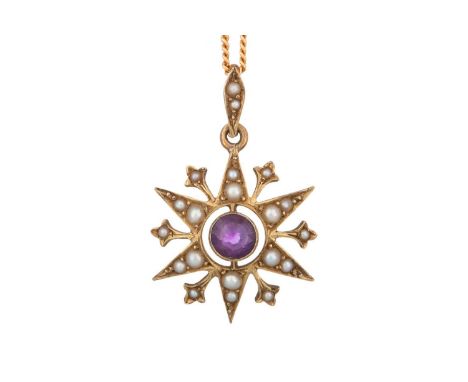 EDWARDIAN AMETHYST AND SEED PEARL STAR PENDANT, the pendant in fifteen carat gold, on a nine carat gold chainGenerally worn. 