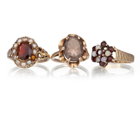 GARNET AND OPAL DRESS RING, along with a garnet and seed pearl dress ring and a citrine dress ring, each in nine carat goldQt