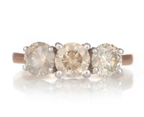 CERTIFICATED DIAMOND THREE STONE RING, the diamonds totalling approximately 2.25 carats, in eighteen carat rose gold, size L 