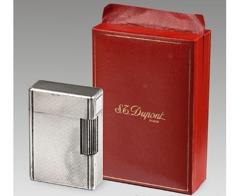  A Cased Silver-Plated Lighter, S. T. Dupont the rectangular body with engine-turned decoration 4,5cm high  