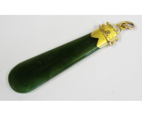  A Gold-Mounted Nephrite Green Jade Pendant the tapering body applied with a gold top engraved with scrolling foliage approxi