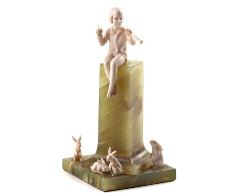  Ferdinand Preiss (1882-1943): A Carved Ivory And Onyx Figurine 'Girl With Rabbits', Circa 1925  14cm high  NOT SUITABLE FOR 