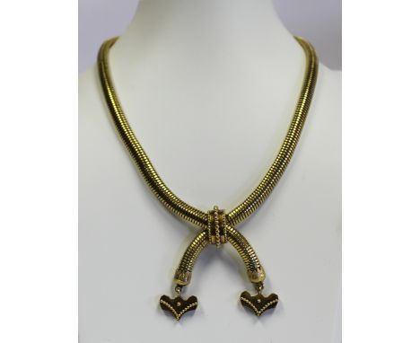  A Victorian Gold Necklace the articulated link chain of cross over design centred with a beaded hoop and with a pair of styl