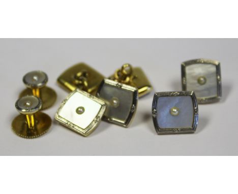  A Cased Set Of 18ct Gold, Platinum And Mother- Of-Pearl Dress Studs And Cufflinks comprising: a pair of screw studs, a pair 