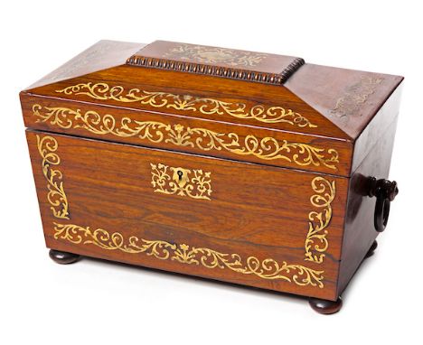  A 19th Century Sarcophagus Shaped Tea Caddy having brass inlay on hinged top and front with ring drop handles to side, inner