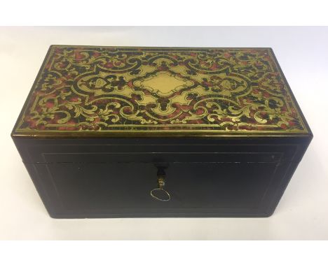  A Boulle Topped Tea Caddy, 19th Century the rectangular ebonised body with brass stringing throughout, hinged cover with tor
