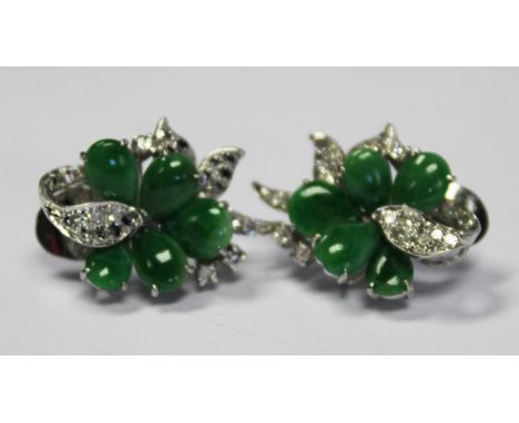  A Pair of Jade and Diamond Clip Earrings each of foliate design, centered by five claw-set jade teardrops, surround by old E