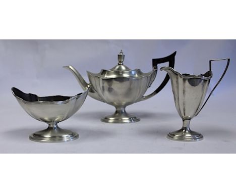  An Edwardian Three-Piece Silver Tea Set, Import Marks, Gorham Manufacturing Co, Birmingham, 1904 comprising: a teapot, a mil