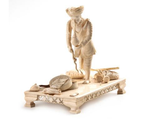  A Carved Ivory And Sandalwood Figure Of A Snake Charmer,Possibly Lucknow, North India, 19th Century NOT SUITABLE FOR EXPORT 