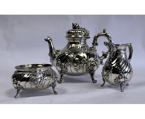  A German Three-Piece Silver Tea Set, L. Posen, .800 Standard comprising: a teapot, a milk jug and a sugar basin, each balust