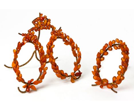  Two Russian Amber And Brass Easel-Backed Picture Frames, 19th Century one with two oval frames joined by a central crown-sha