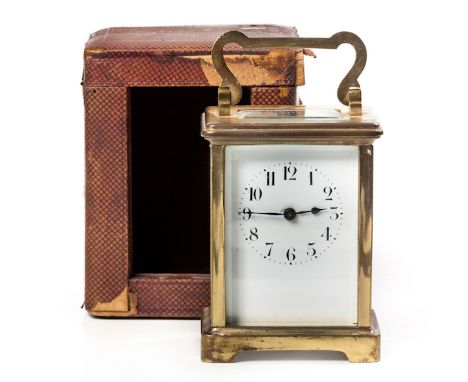  A Brass Carriage Clock, Early 20th Century in leather case, eight day strike repeating movement, off-white dial with arabic 