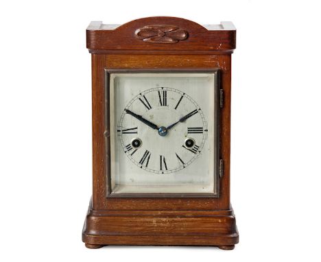  A Hamburg American Corporation (HAC) Oak Bracket Clock, Early 20th Century with gabled top, silvered dial with Roman numeral