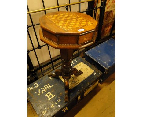 An Antique mahogany games top trumpet work table,with carved tripod legs, width 1'4", height 2'6".