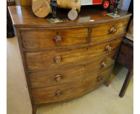 A 19th century mahogany bow front 5 drawer chest on bracket feet