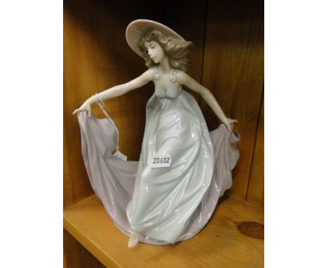 A Lladro figure of a dancing girl.