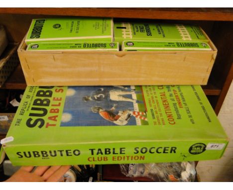 A boxed Subbuteo table soccer game.