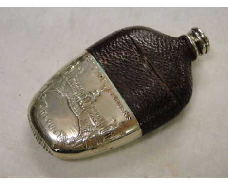 A 1904 World's Fair souvenir vesta modelled as a spirit flask