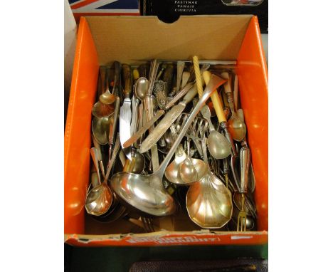 Plated ladle, silver-handled bread knives and other cutlery.