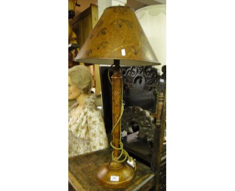 A Tollware design table lamp with grapevine decoration and matching shade