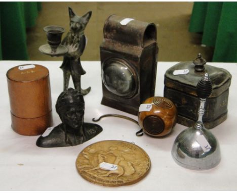 A lantern, fox figure candlestick, desk bell, tobacco box, etc.