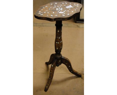 A small Antique mother of pearl inlaid tripod table.